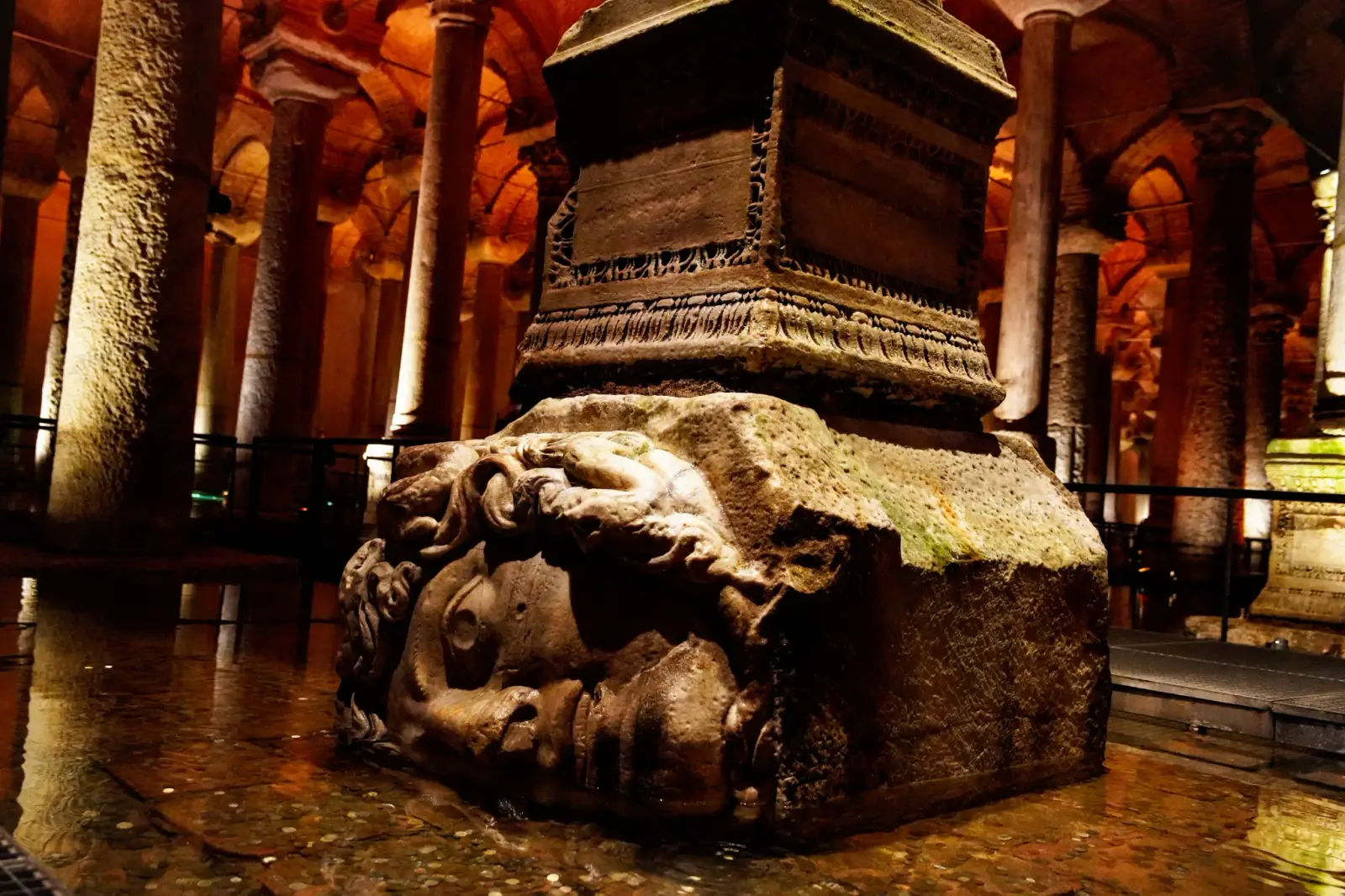Carved Medusa head serving as a column base in the Basilica Cistern